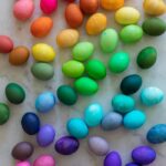 Rainbow Easter eggs dyed with food coloring for a vibrant Easter celebration