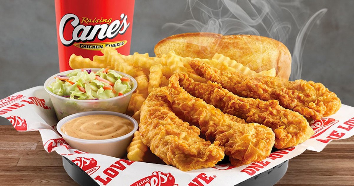 Raising Cane's fast food box combo meal deal featuring chicken fingers, fries, and toast.