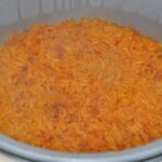Red Rice, a staple Chamorro dish, vibrant with achiote.