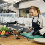 Restaurant staff wearing food service gloves