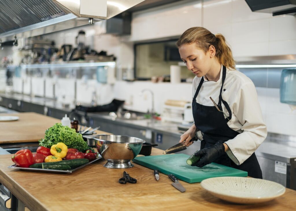 Restaurant staff wearing food service gloves