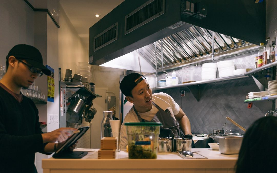 Richard Ho, owner of Ho Foods, in his East Village restaurant