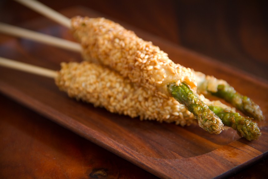 Sesame Pancetta Asparagus Sticks elegantly arranged for a party