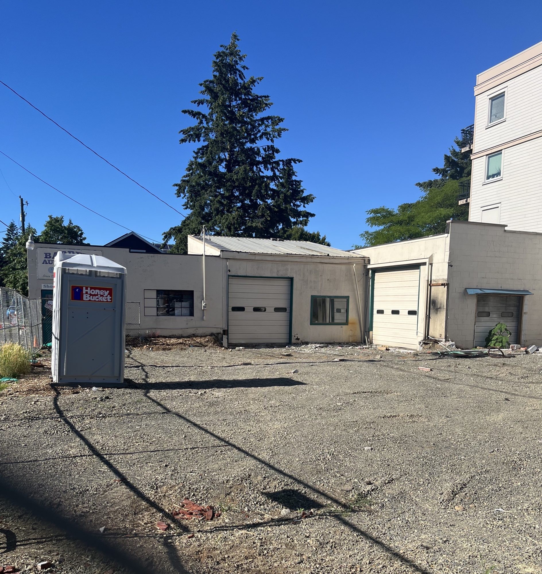 The lot that will be home to the Fremont Street food cart pod, photographed in June 2024, showing initial demolition work