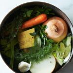 Vegetable scraps in a zip-top bag ready for stock