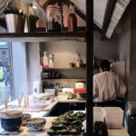 Viet Food restaurant in London's Chinatown features an open kitchen where diners can watch Vietnamese food being prepared.