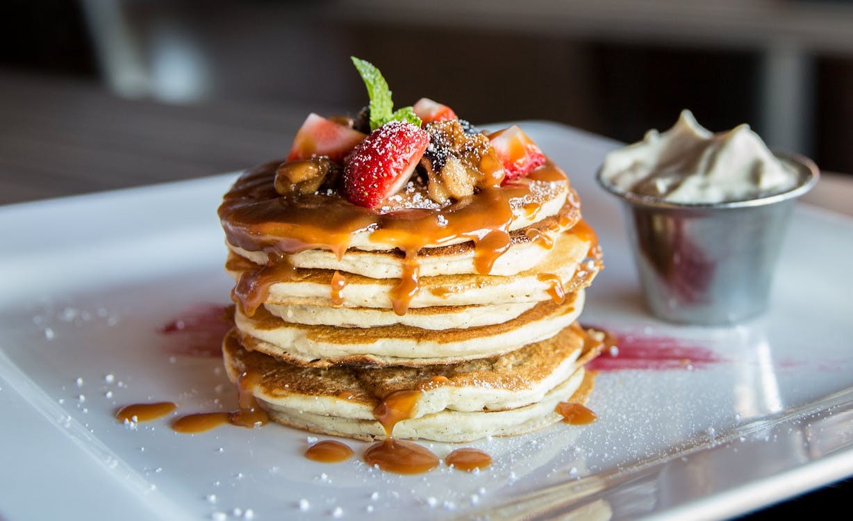 A vibrant and diverse spread of healthy foods, including fruits, vegetables, whole grains, and lean protein sources, arranged to showcase a balanced and nutritious meal.