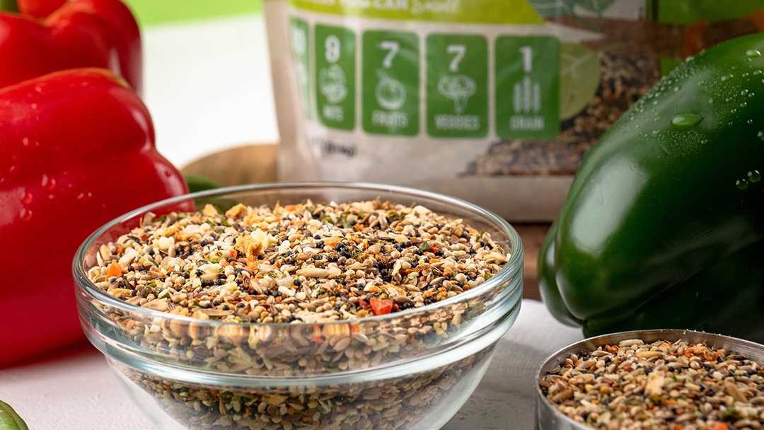 A close up of a bowl filled with mixed seeds