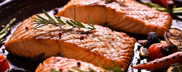 A perfectly grilled salmon fillet, showcasing its rich color and healthy fats