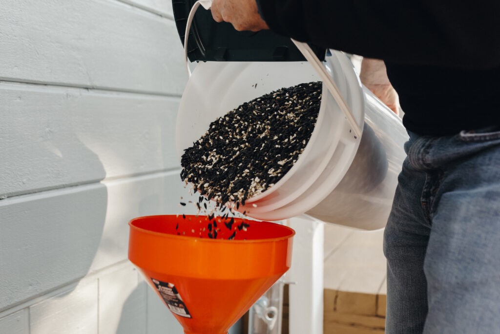 The Chirp seed bucket, available with a Chirp Seed Club membership, showcasing proper storage.