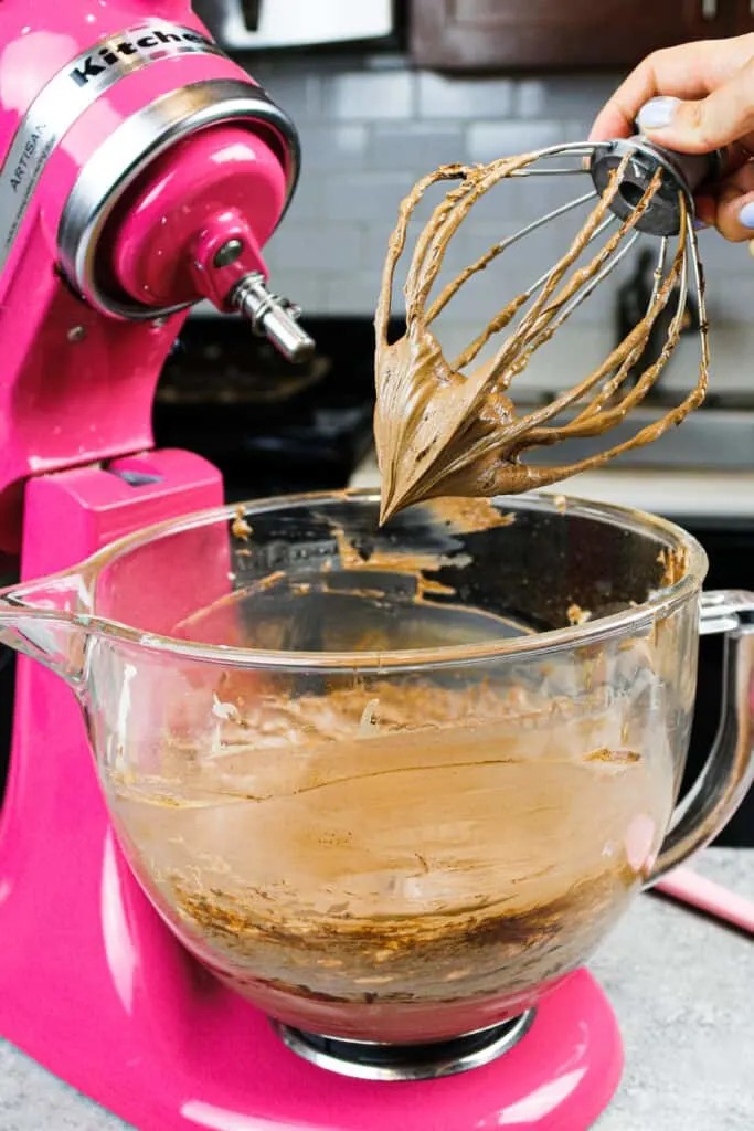Chocolate russian buttercream on a whisk attachment