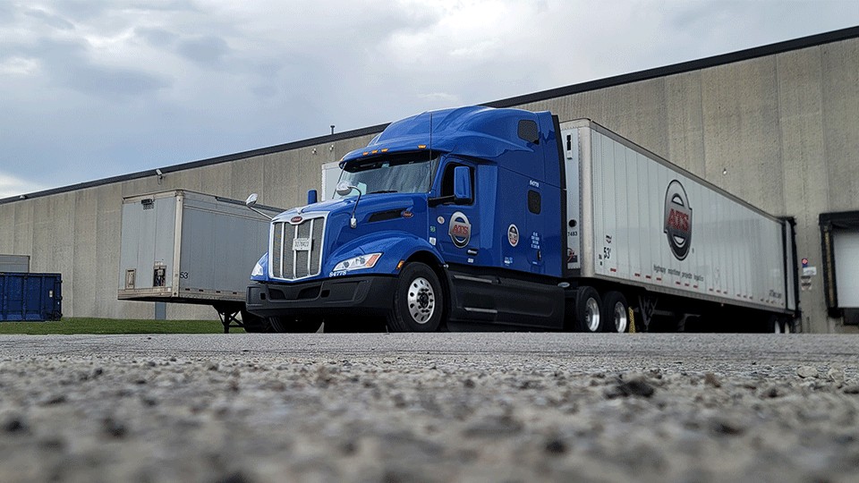 Semi-truck-at-food-warehouse-loading-dock