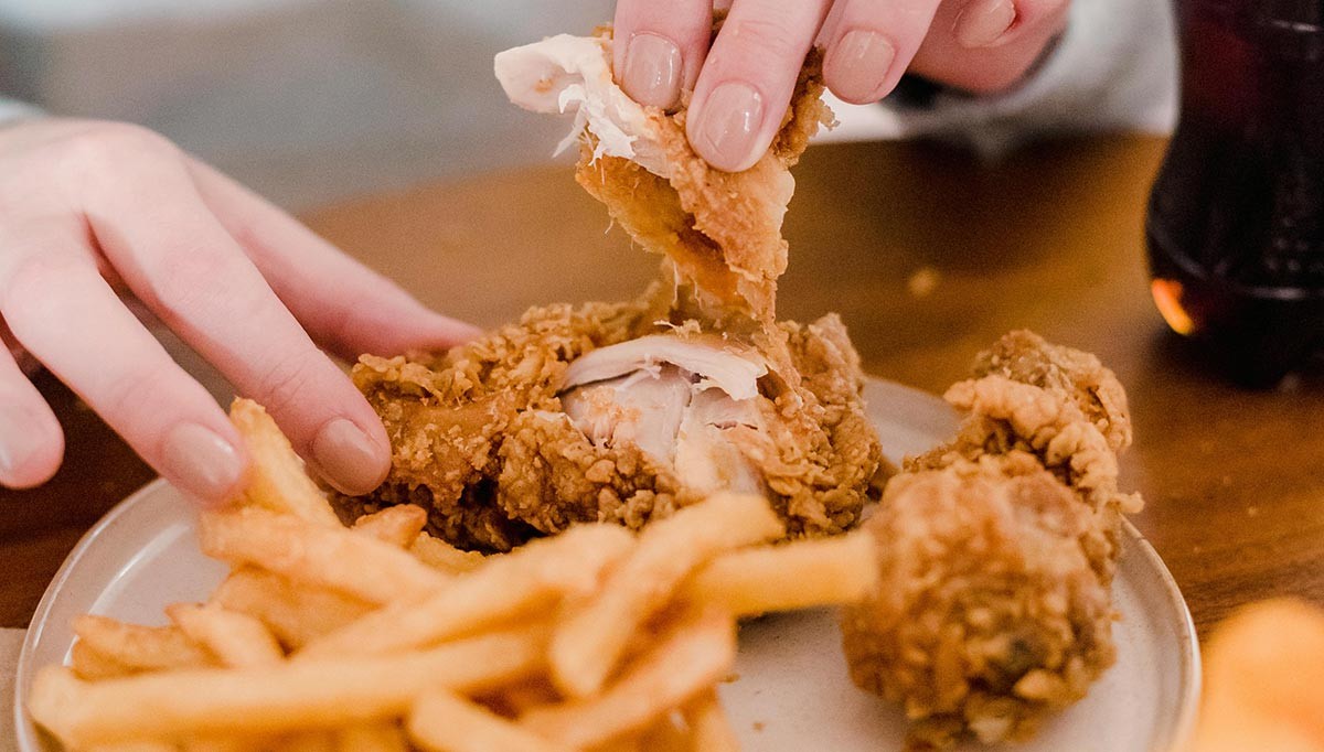 Crispy fried chicken, a classic soul food dish rooted in African cooking techniques.