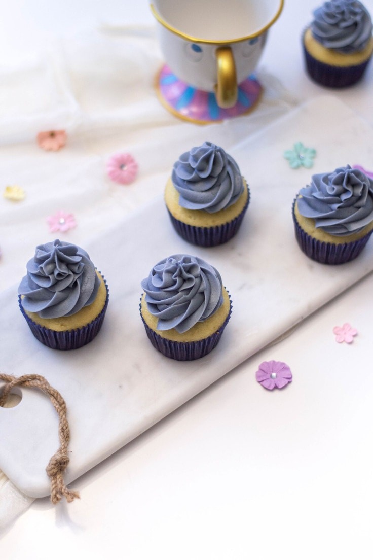 Close-up showcasing various tools used in cake decoration, emphasizing precision and expertise.