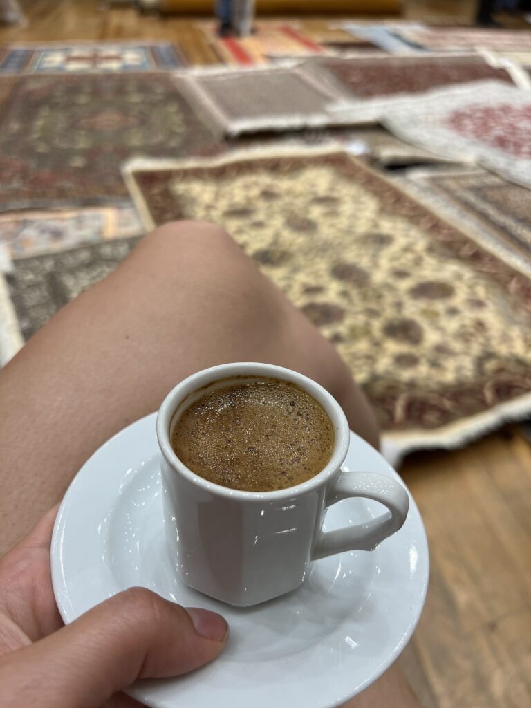 A cup of traditional Turkish coffee served in a small cup