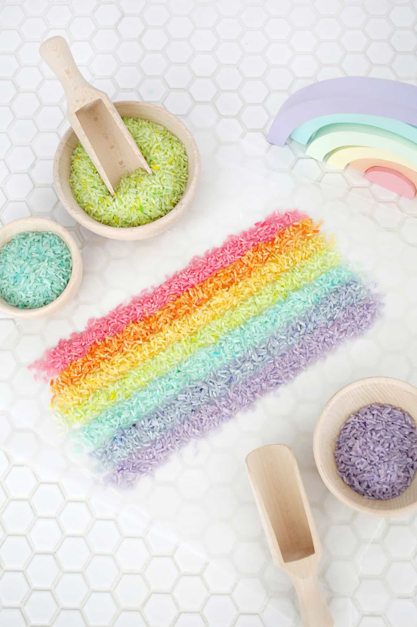 Rainbow sensory bin with colored rice