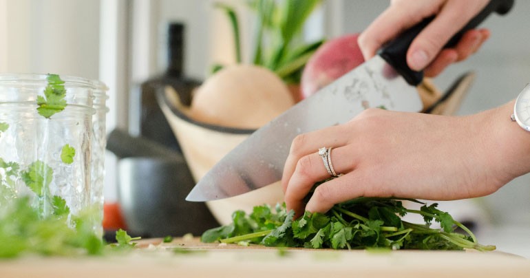 Ingredients arranged on a wooden cutting board, ready for meal prep.