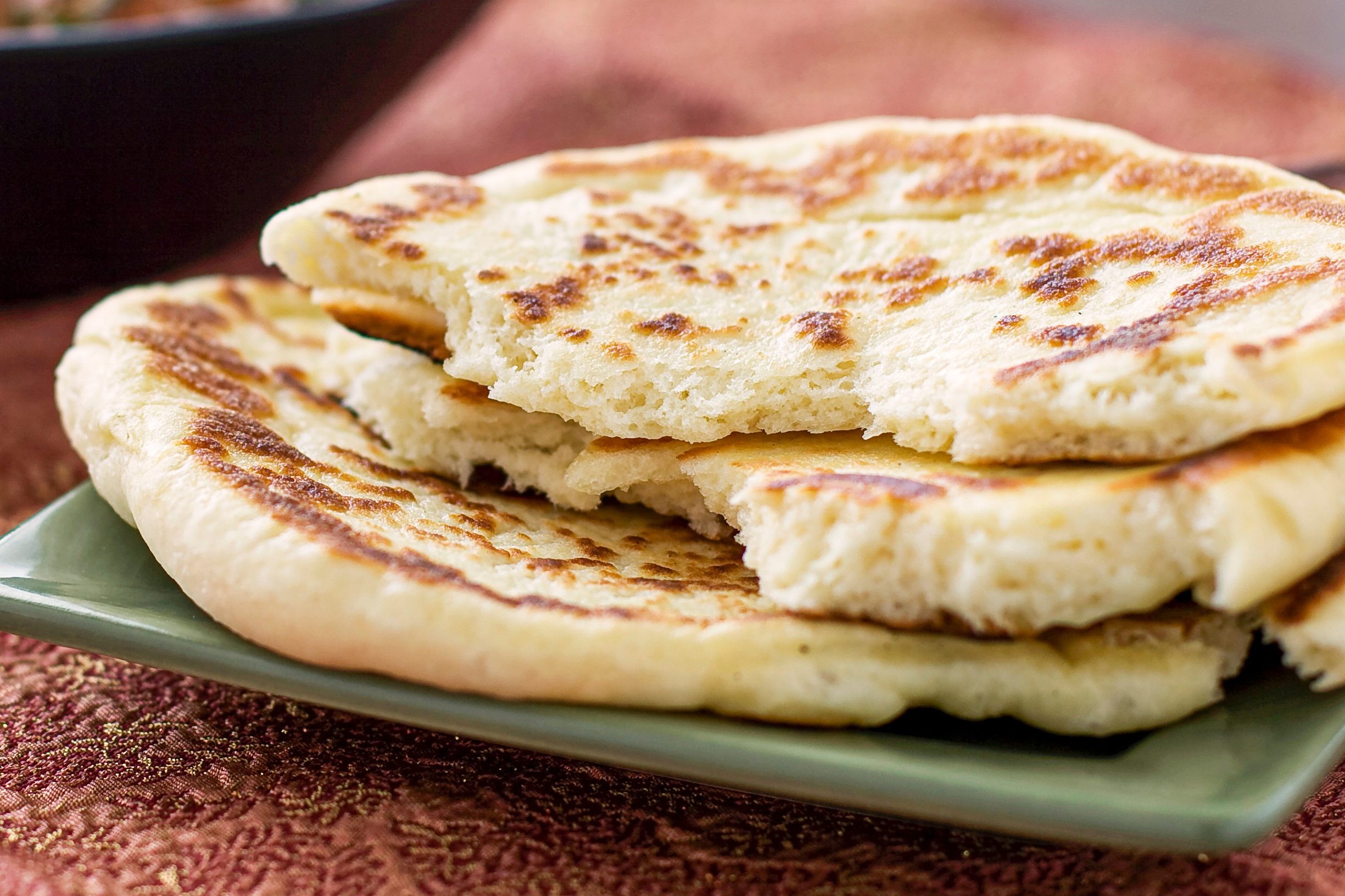Naan bread, showcasing a carbohydrate option that can contribute to your daily calcium intake.