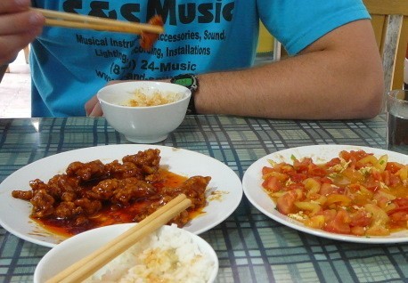 Family sharing dishes at a Chinese restaurant