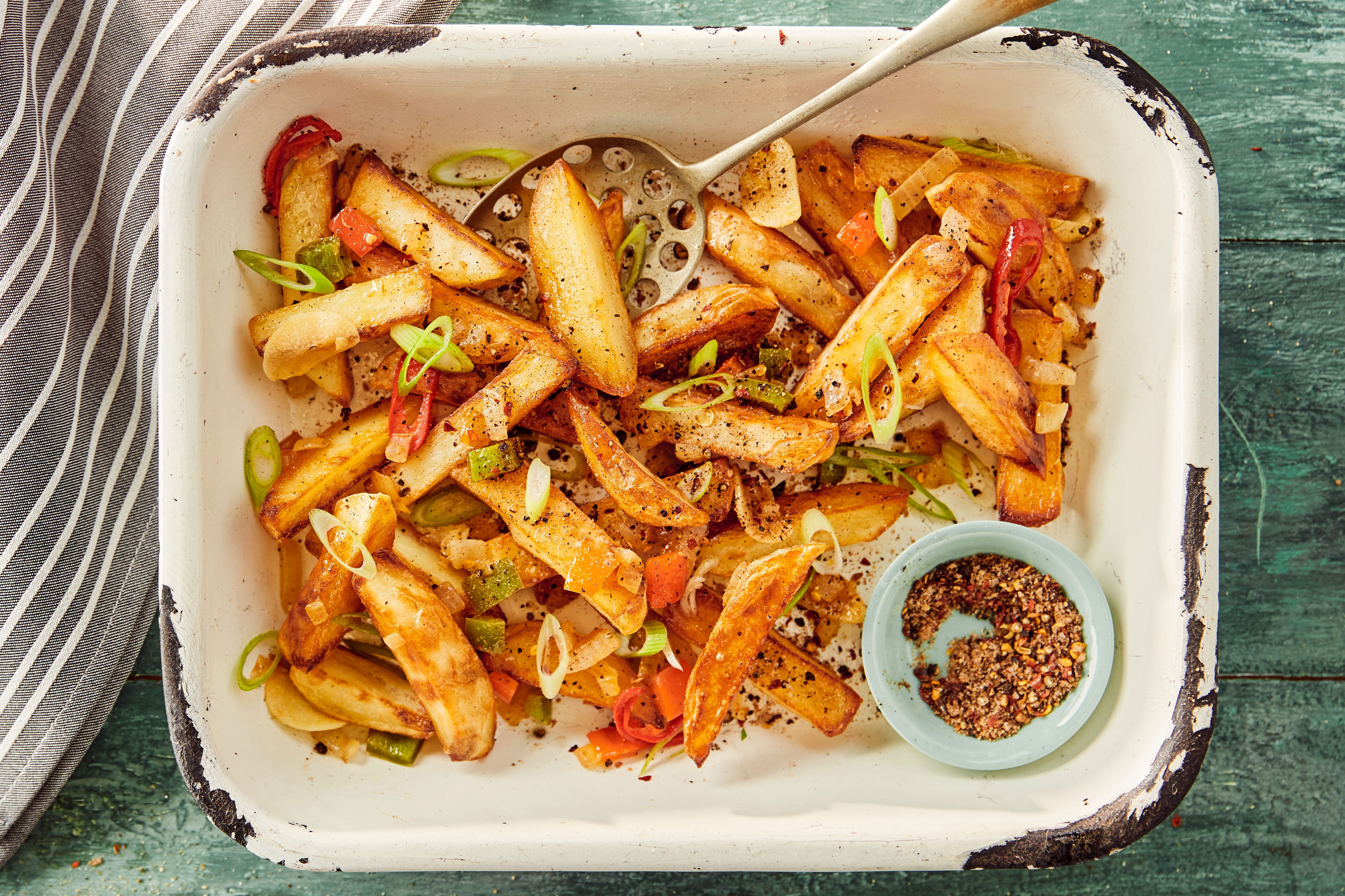 Salt & pepper chips in a small baking dish