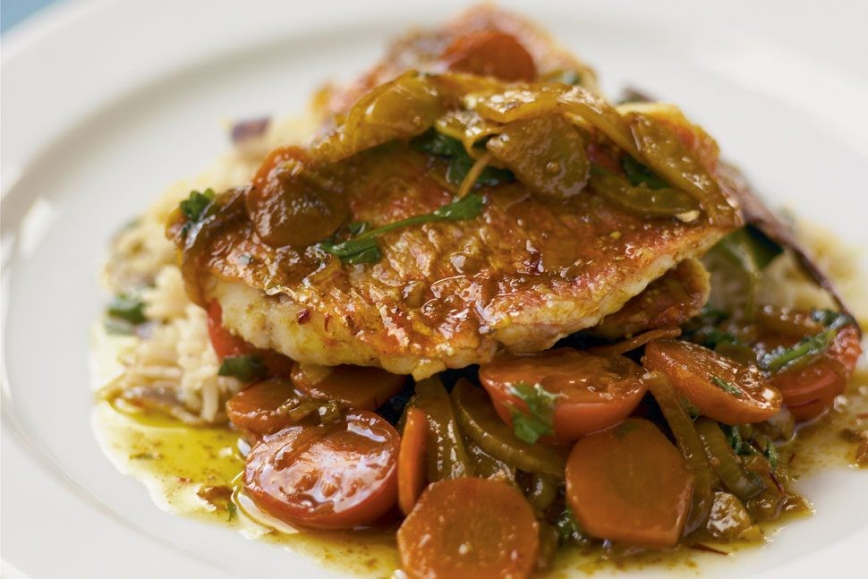Seared red mullet on a bed of rice and carrots