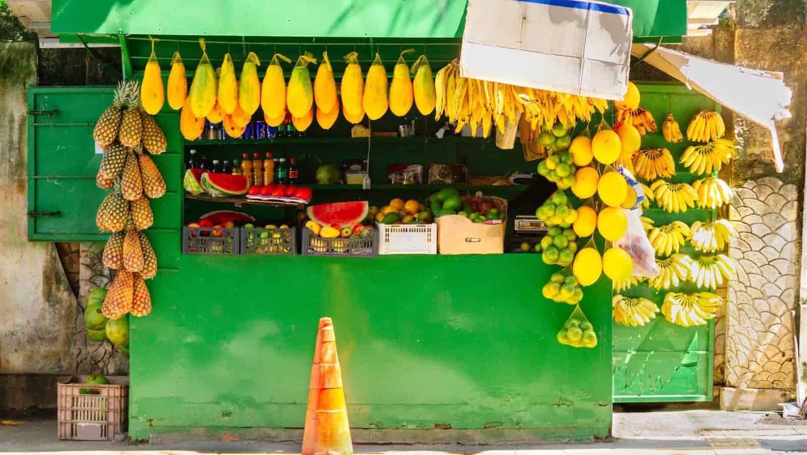 A street stall selling fruit in Salvador, Brazil, showcasing the fresh and vibrant ingredients that are central to Brazilian cuisine