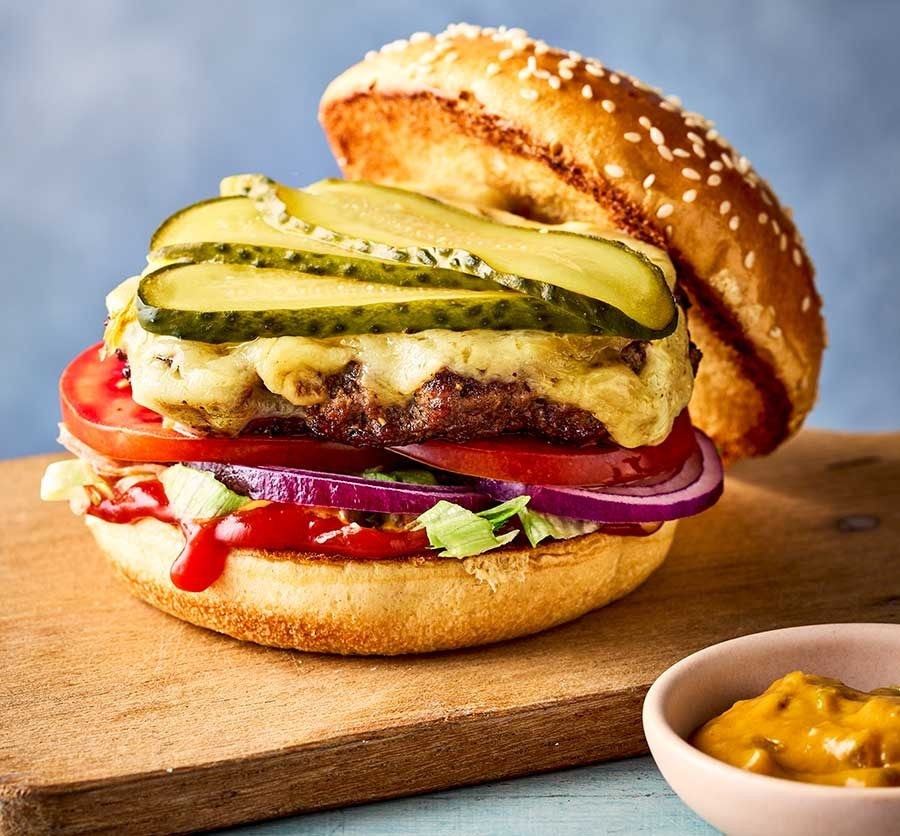 One smash burger on a board