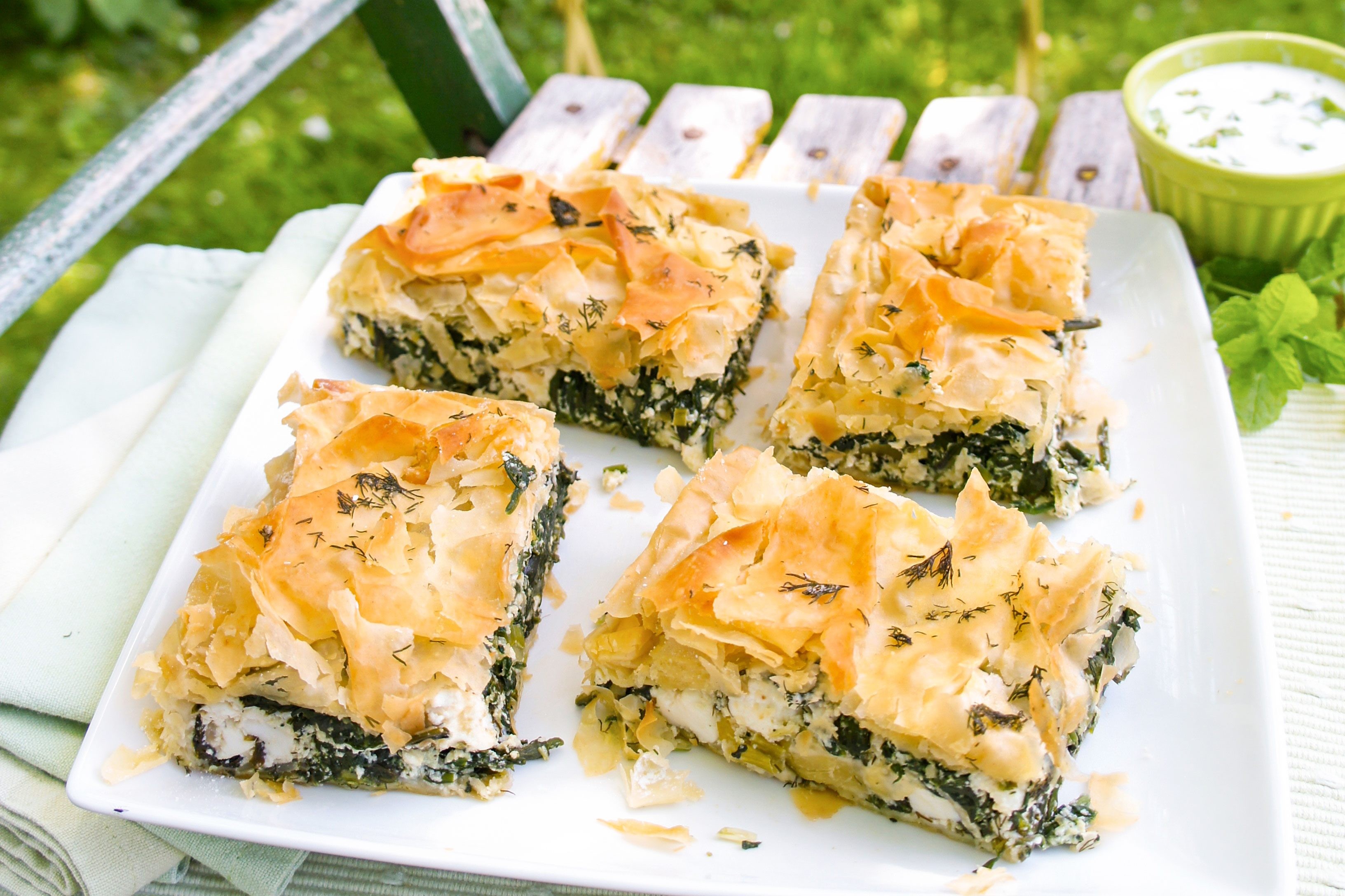 Spanakopita cut into 4 pieces