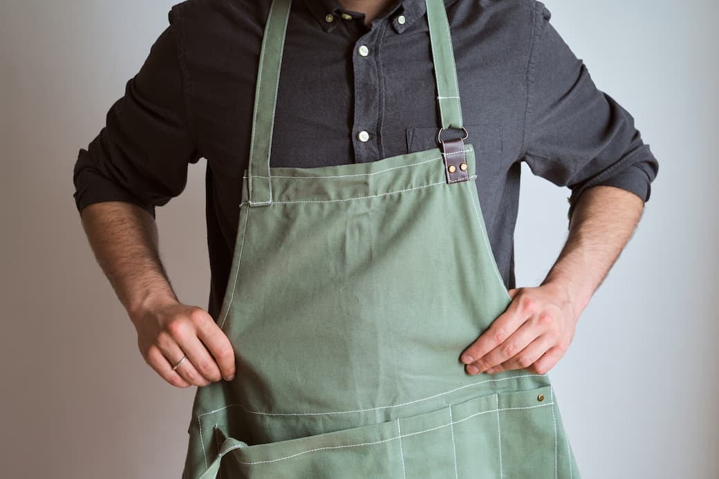 Food handler in clean apron