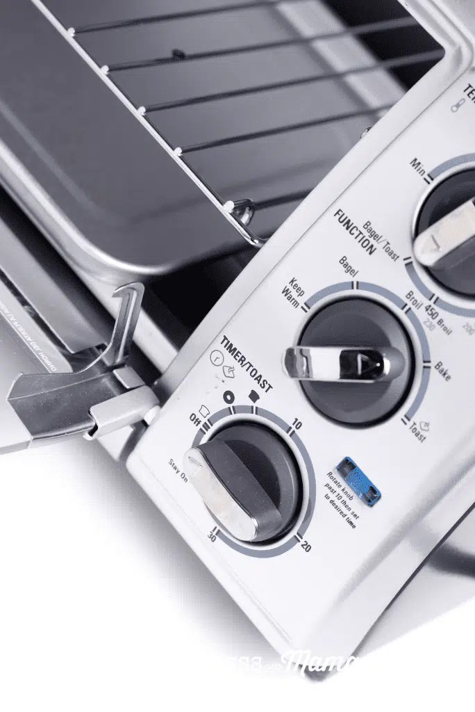 Toaster oven with temperature and function dials clearly displayed