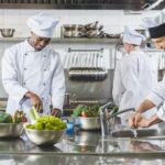 Food handler washing hands thoroughly