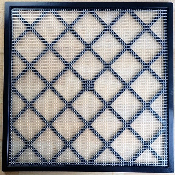Excalibur dehydrator tray has rigid plastic framework with flexible mesh sheets that sit on top. Size: 15
