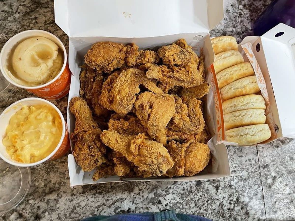Popeyes 14-Piece Tender Family Meal served with two large sides and five biscuits
