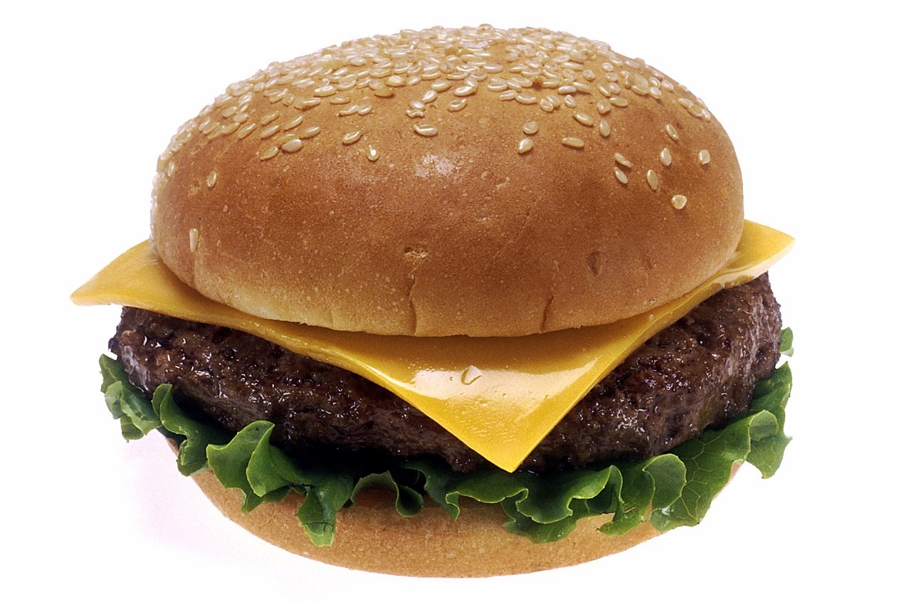 Classic American Cheeseburger with Lettuce, Tomato, and Pickles