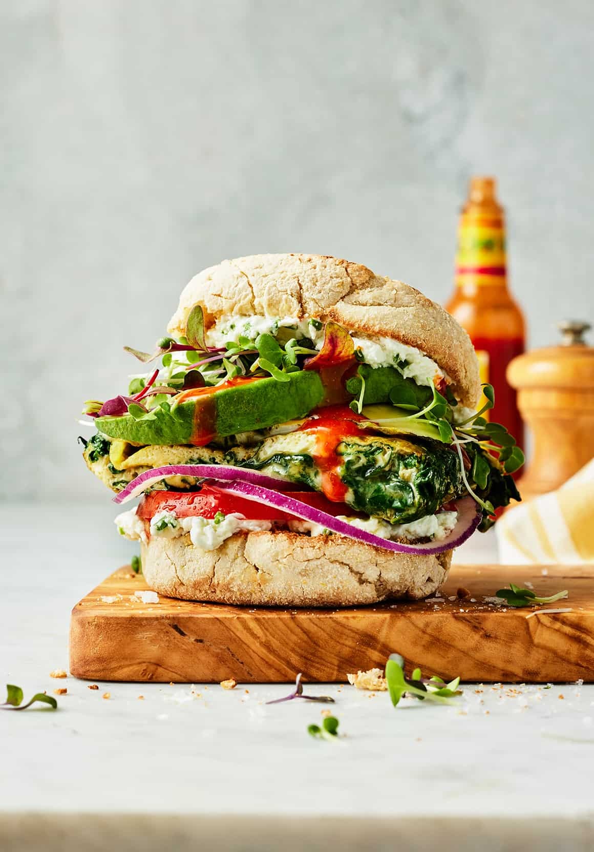 Epic breakfast sandwich with egg and vegetables