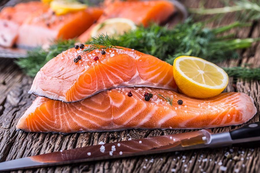 Fresh salmon fillet with lemon and herbs