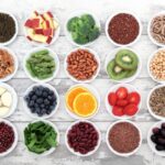 Assortment of colorful superfoods in bowls
