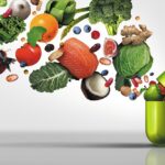 Supplement capsule bursting with fruits and vegetables