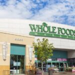 Shelves stocked with fresh produce at Whole Foods Market