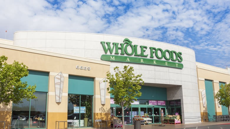 Shelves stocked with fresh produce at Whole Foods Market