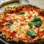 Neapolitan pizza with fresh basil and mozzarella