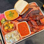 Interstellar BBQ's mouthwatering brisket taco and pork belly bites