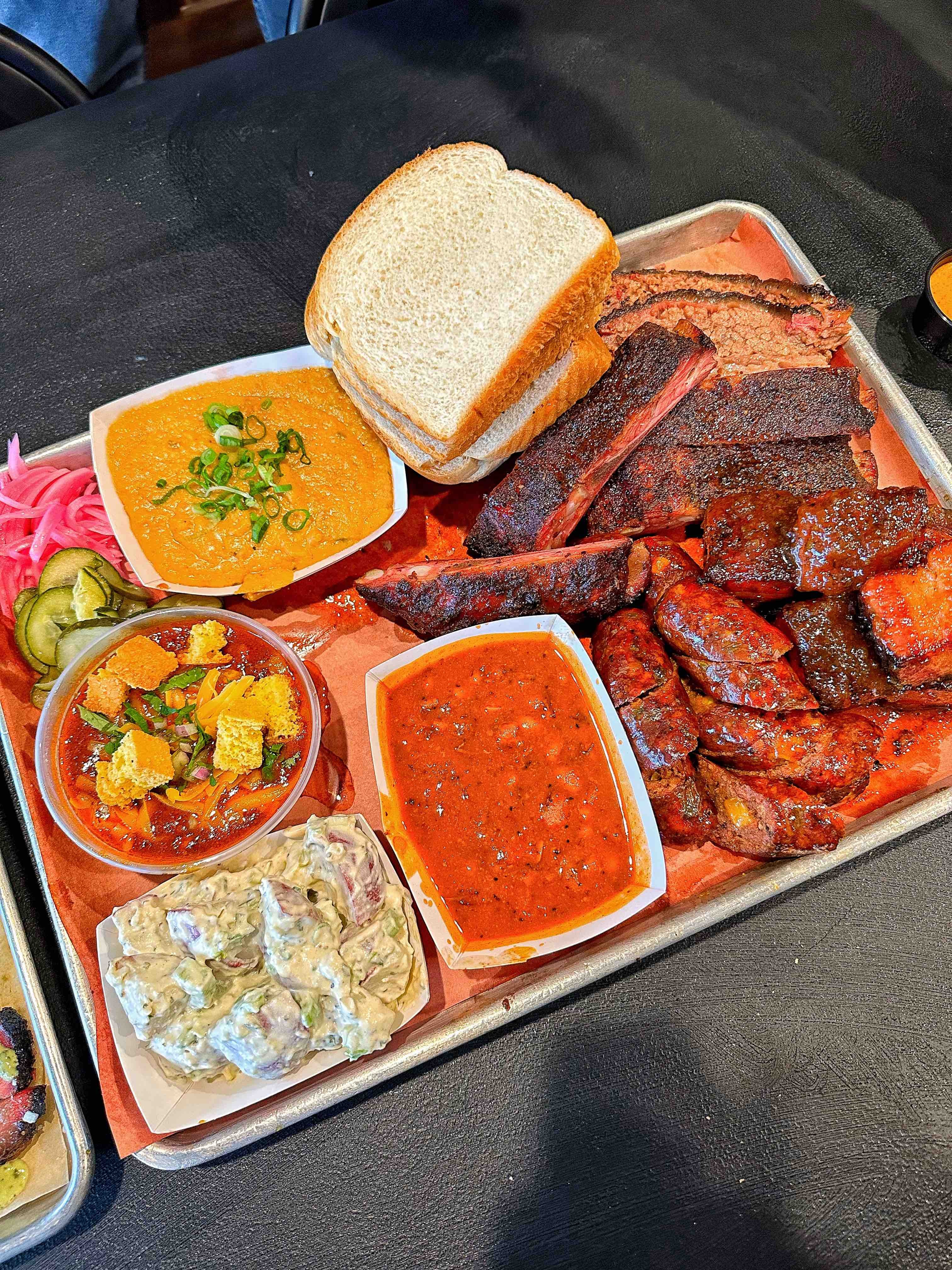 Interstellar BBQ's mouthwatering brisket taco and pork belly bites