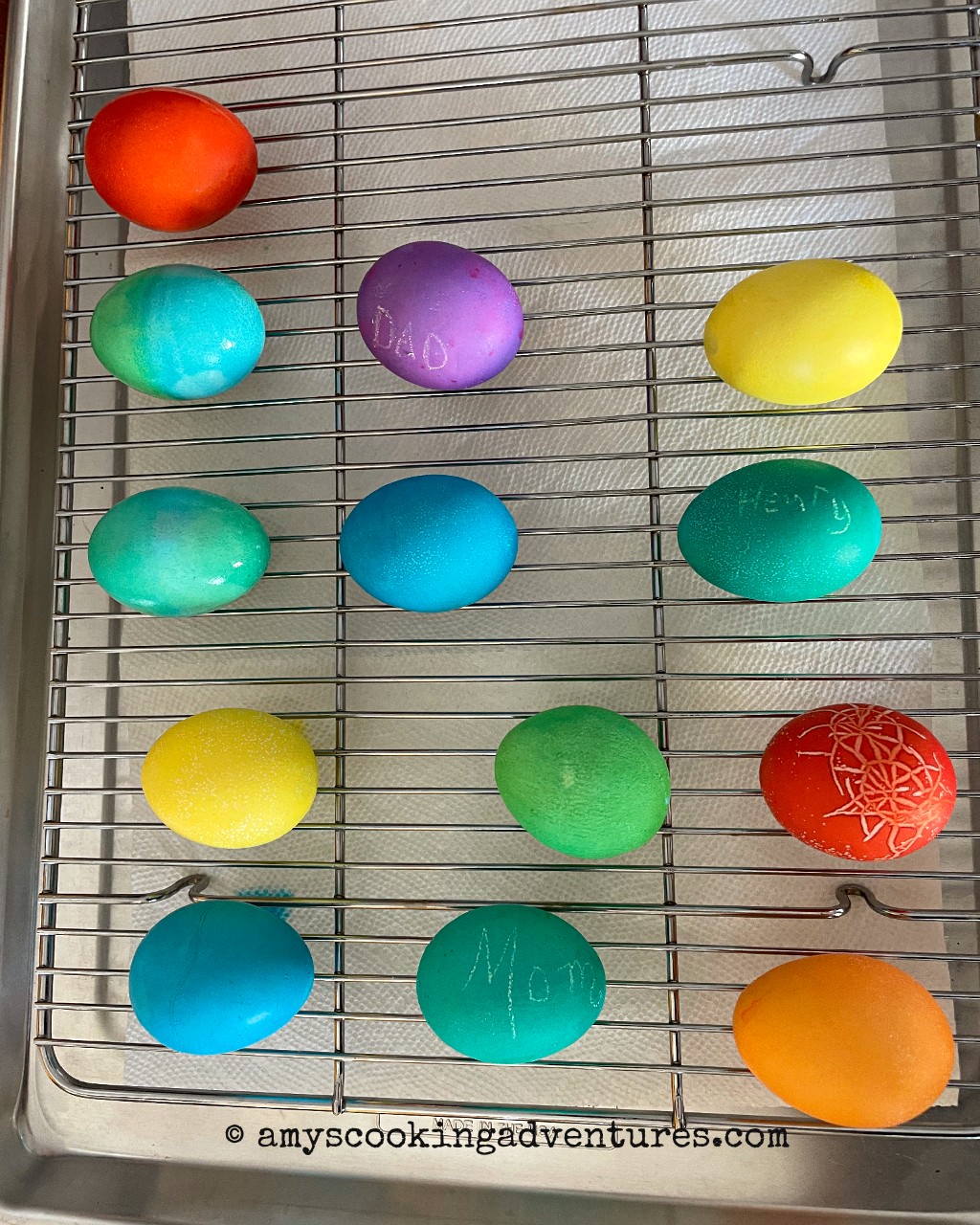 Assorted vibrant Easter eggs dyed with gel food coloring, displaying rich and even colors