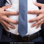 Person Holding Stomach Ache
