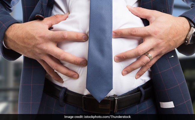 Person Holding Stomach Ache
