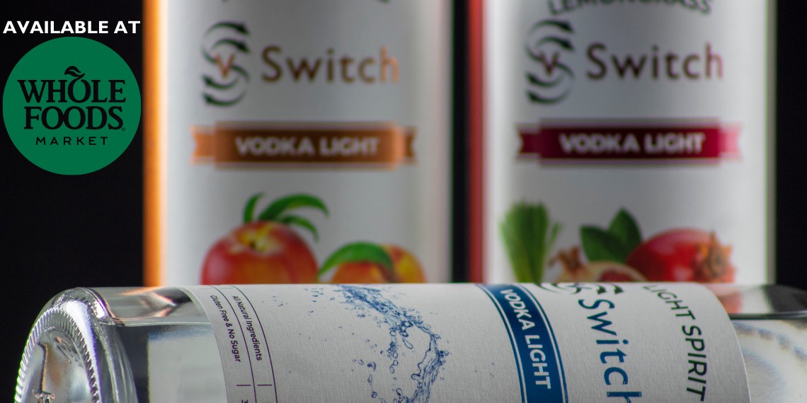 Variety of alcohol bottles at Whole Foods, showcasing their selection