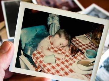 Man asleep on couch after eating