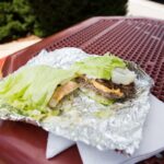 Burger wrapped in lettuce from Five Guys