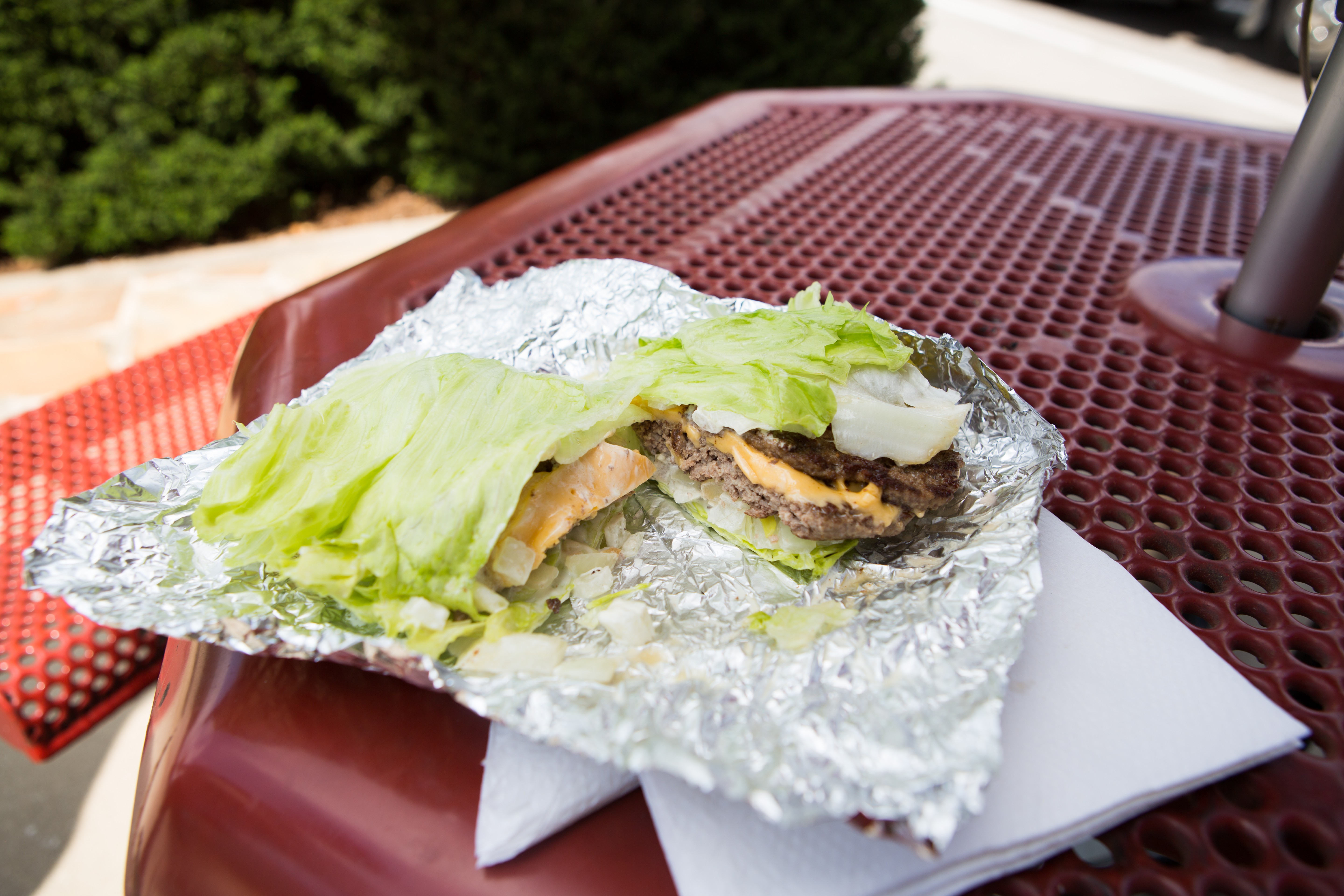 Burger wrapped in lettuce from Five Guys
